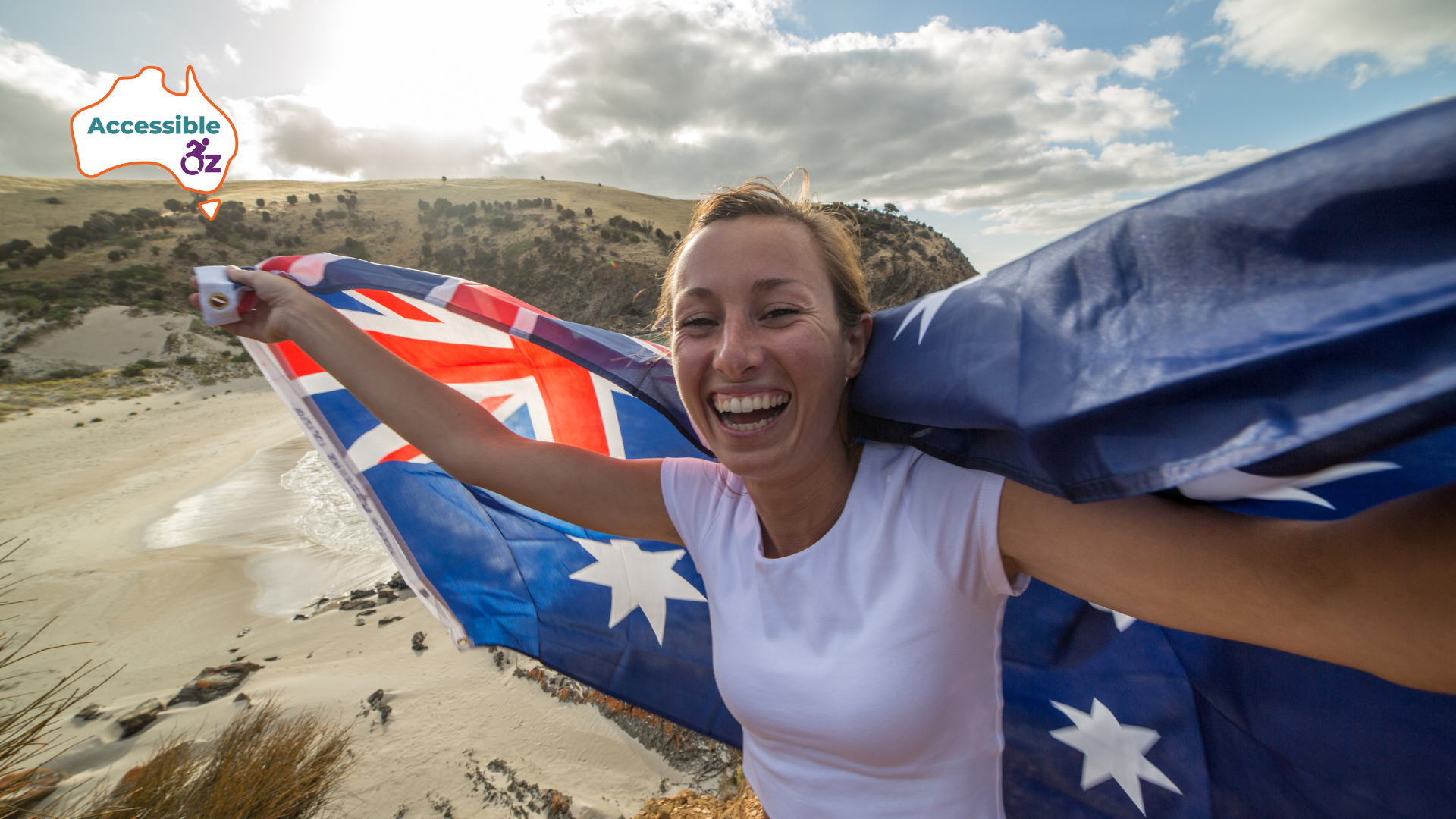 A woman holding the Australia flag.