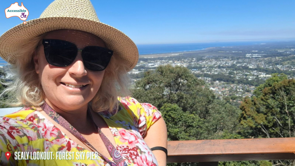 A photo of a woman in the Forest Sky Pier at Sealy Lookout